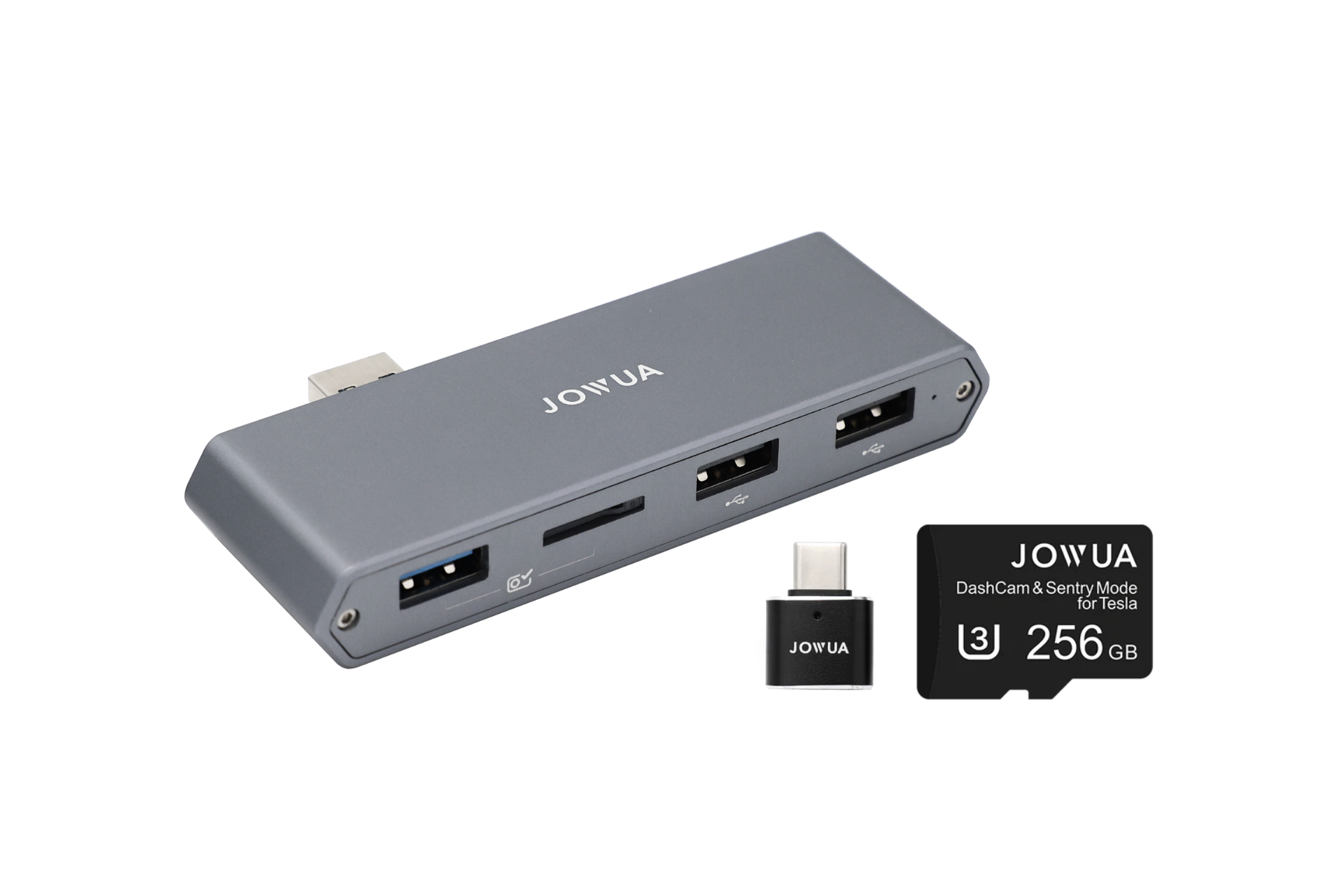 A gray USB hub from JOWUA, featuring multiple ports including USB and card reader slots, perfect for Tesla accessories. Next to it is a USB adapter and a JOWUA-branded 256GB microSD card designed for DashCam and Sentry Mode, with data port expansion to combat electromagnetic interference.