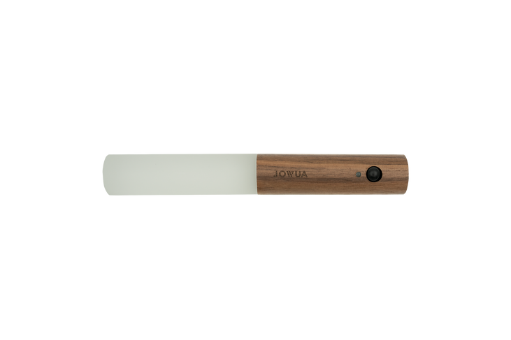 A stylish, portable frother with a white whisk and a wooden handle featuring a small black button. The handle is engraved with the word 