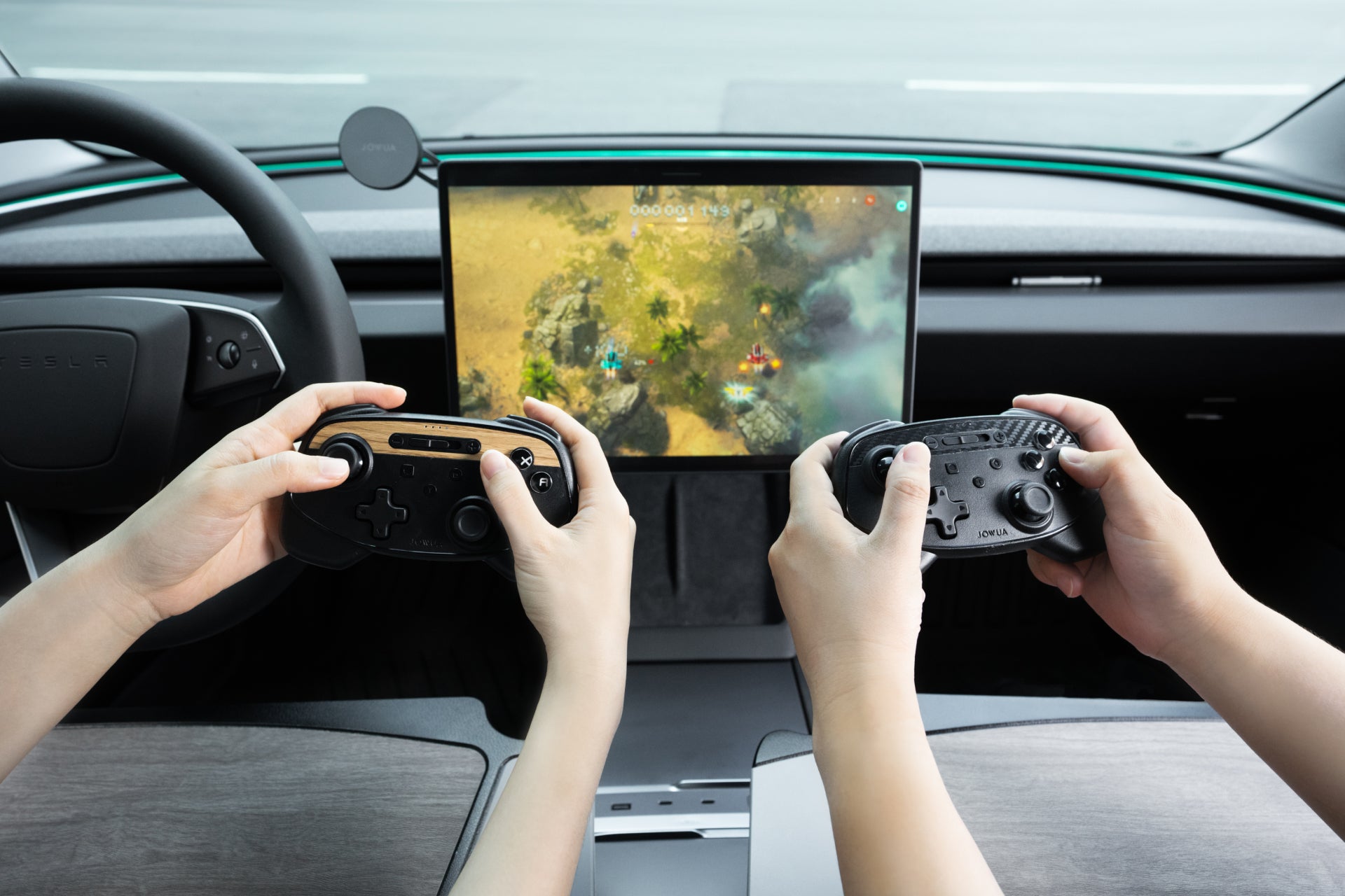 Two individuals are deeply engaged in a video game using the JOWUA Wireless Tesla Game Controllers Combo (Reengineered Model 3 Highland, 2024+), each holding a wireless controller as they focus on the central display inside a car. The steering wheel is visible on the left, and the screen displays a top-down view with various elements, all smoothly integrated through an advanced multi-device switch.