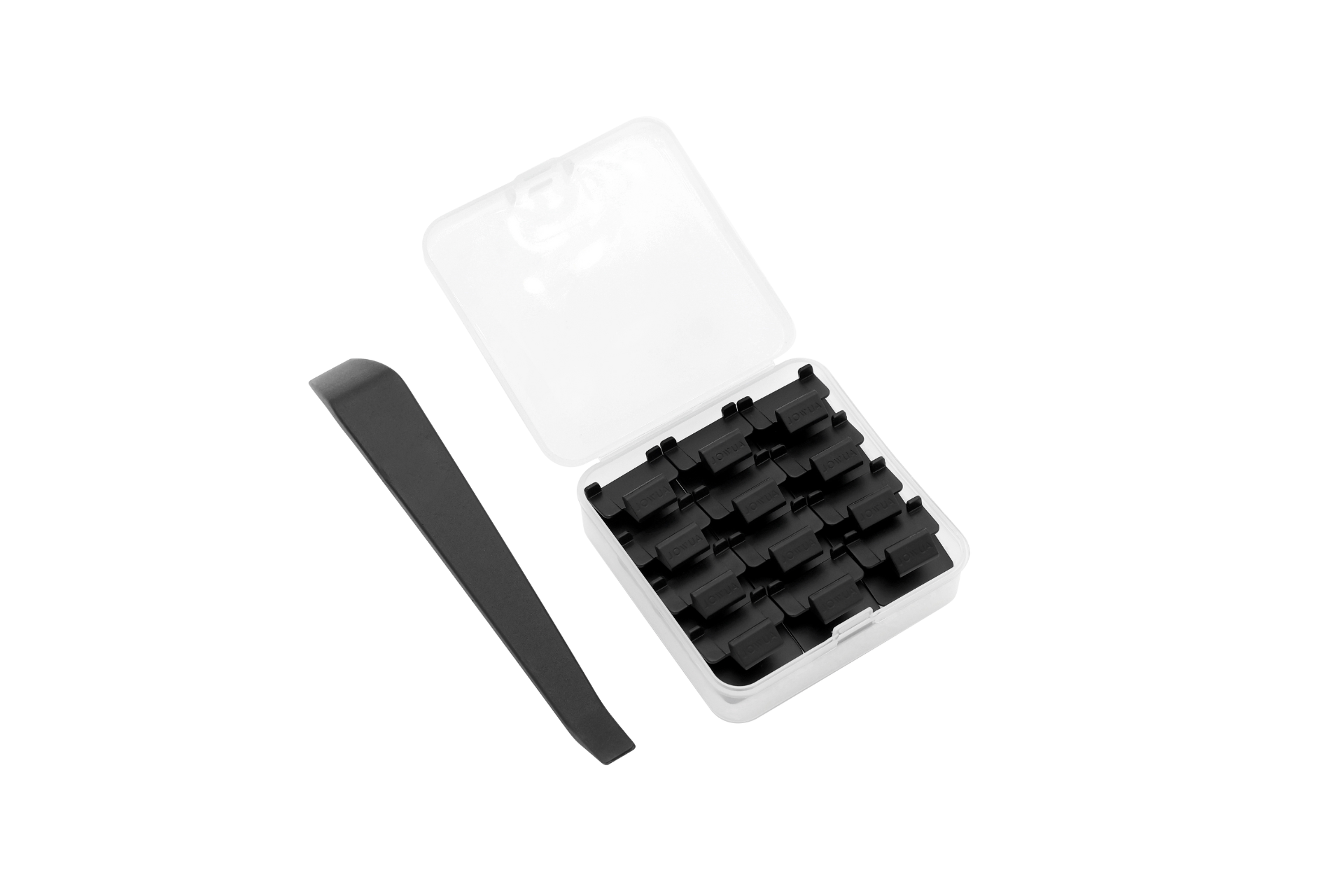 In a small, open white plastic case, a set of black mechanical keyboard keycaps is neatly arranged. Nearby, a black keycap puller tool lies delicately against the dark background, reminiscent of JOWUA's Sunshade Clips.