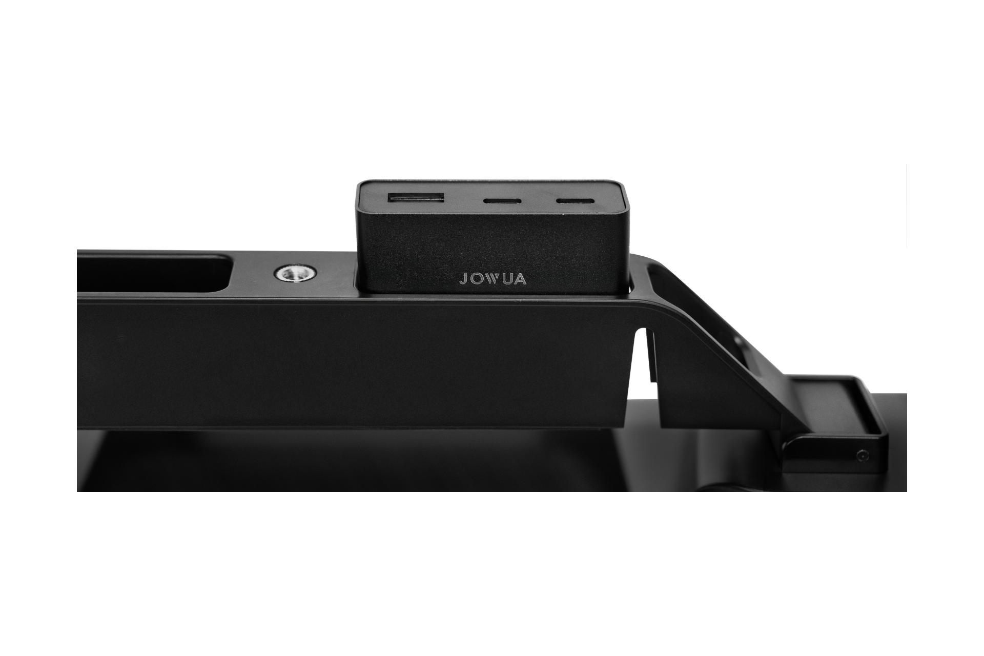 Close-up of JOWUA's "Under Screen Invisible Station," a sleek, black charging hub subtly integrated with Tesla Hub features. It includes a minimalist black stand, multiple ports, and magnetic snap functionality for easy connections.